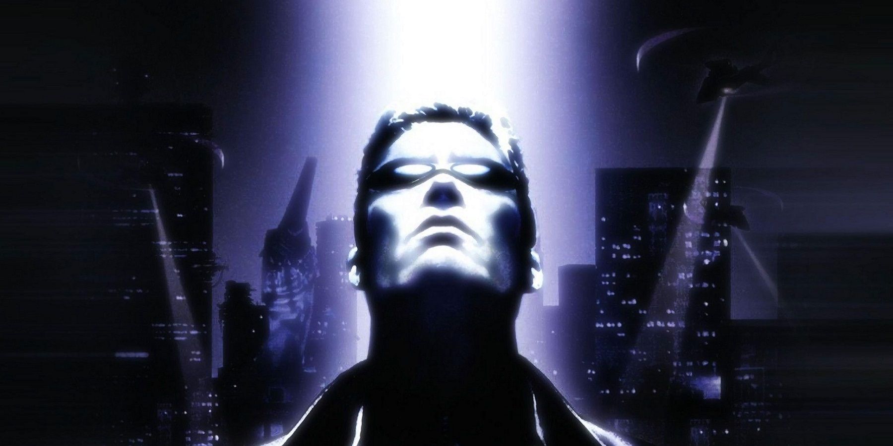 The front cover of the original Deus Ex showing J.C. Denton looking up at a light beaming down.