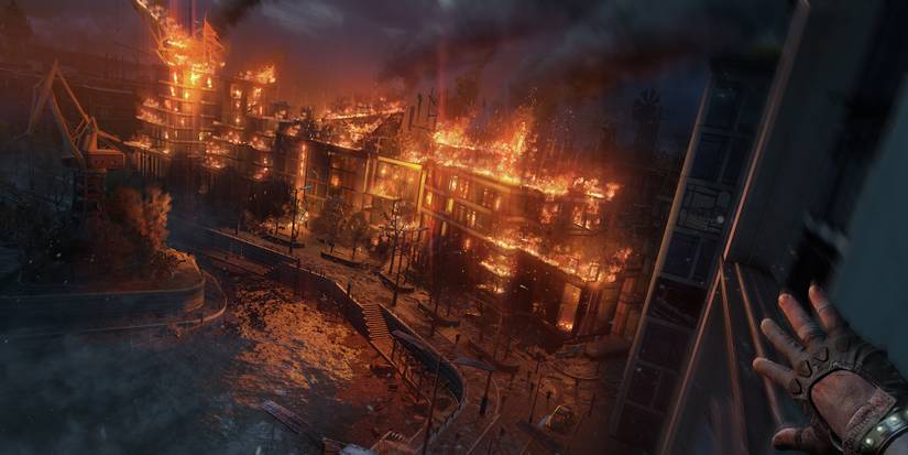 dying light 2 player looking burning village