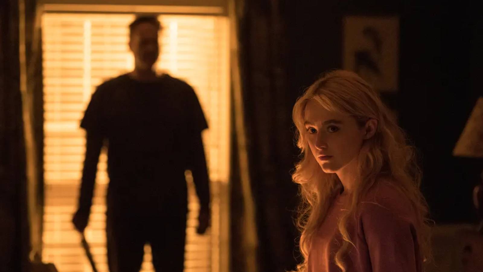 Vince Vaughn standing behind Kathryn Newton in Freaky