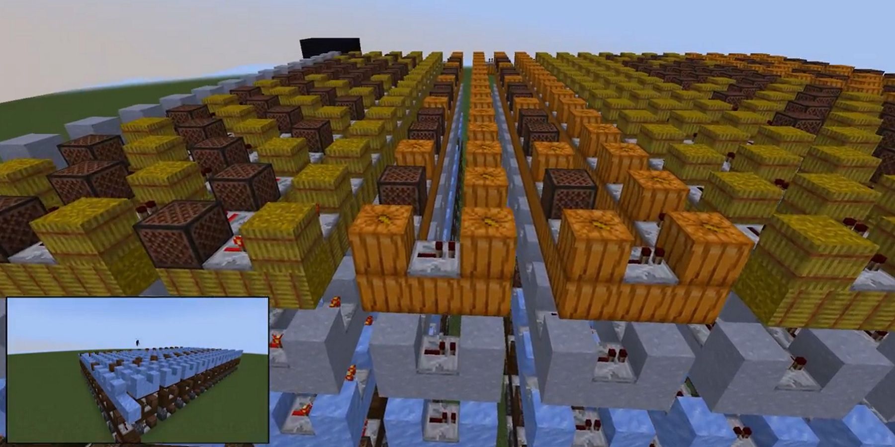 Screenshot from Minecraft showing a series of note blocks, hay, and pumpkins arranged in a grid.