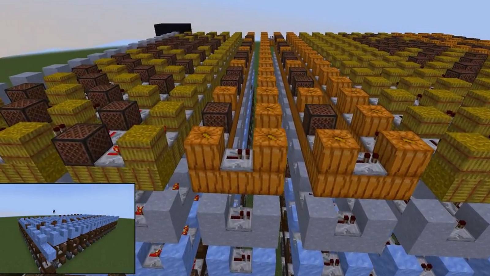 Screenshot from Minecraft showing a series of note blocks, hay, and pumpkins arranged in a grid.
