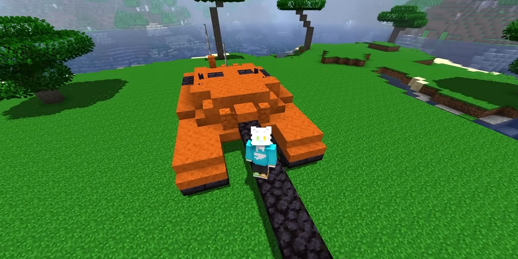 Image from Minecraft showing the player hovering above an orange tank.