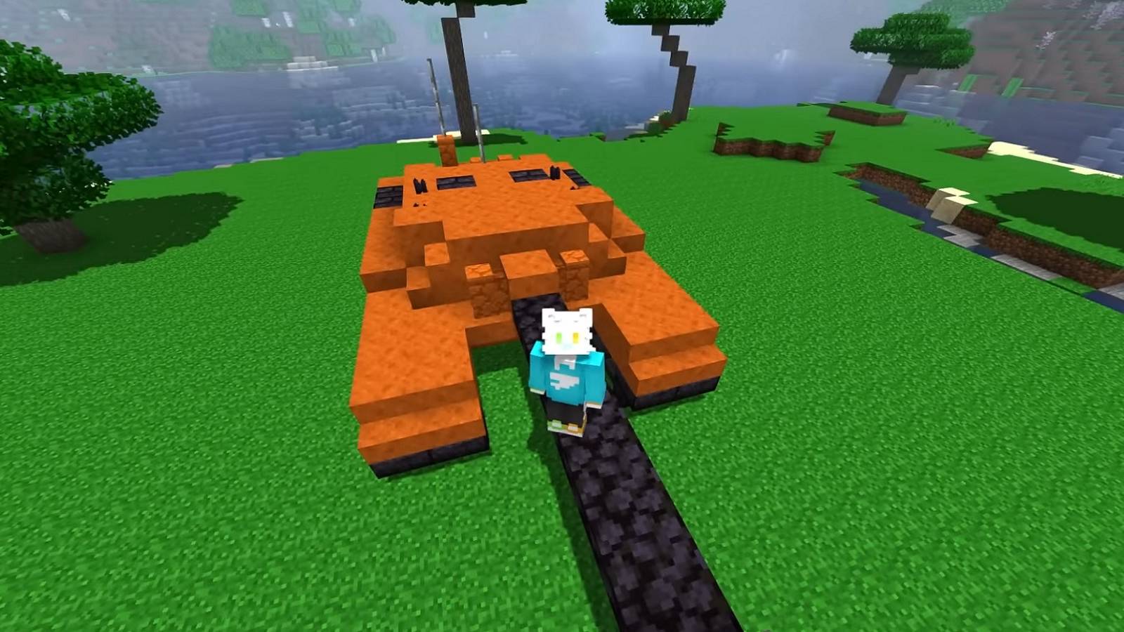 Image from Minecraft showing the player hovering above an orange tank.