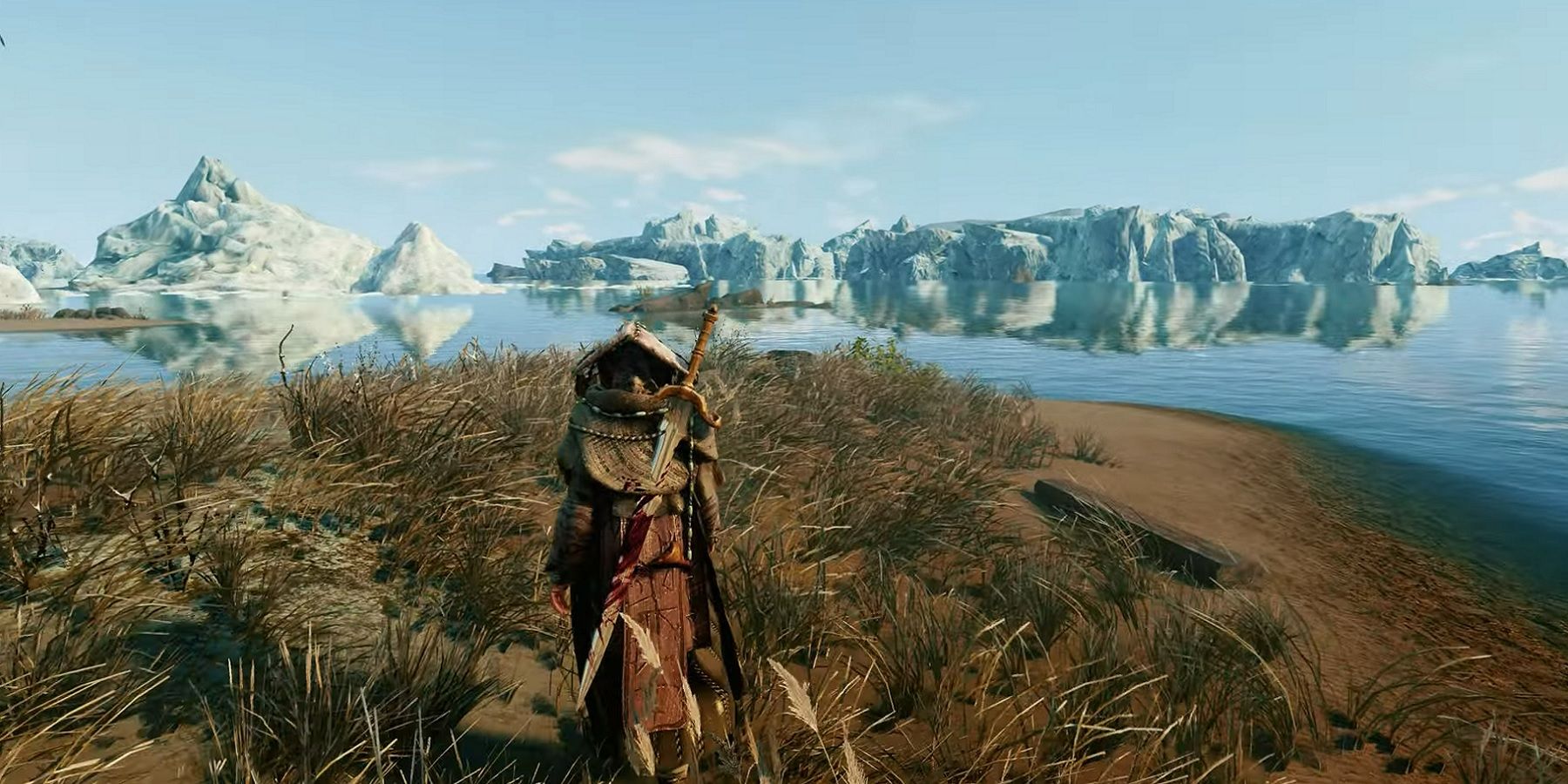 Image from Skyrim showing the player looking out into a body of water with an icy tundra in the distance.