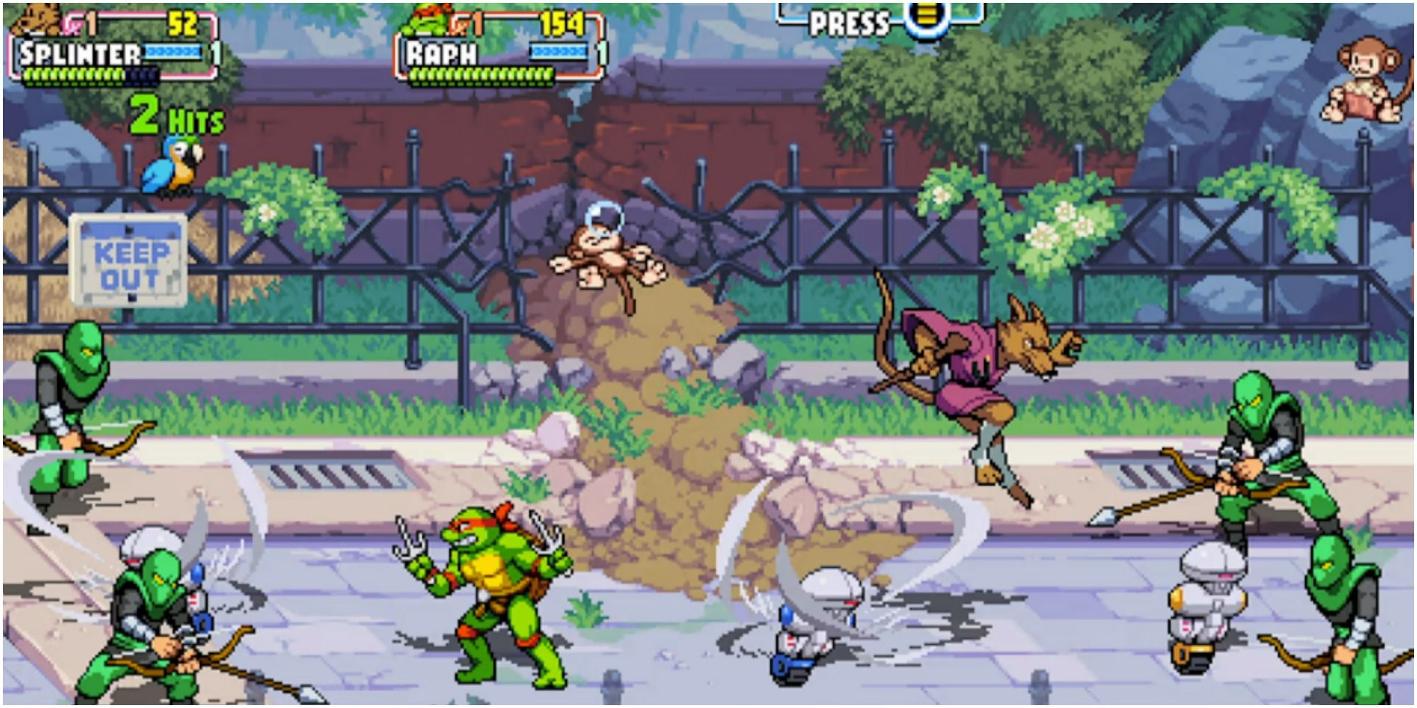 tmnt shredder's revenge characters battling enemies in the zoo stage