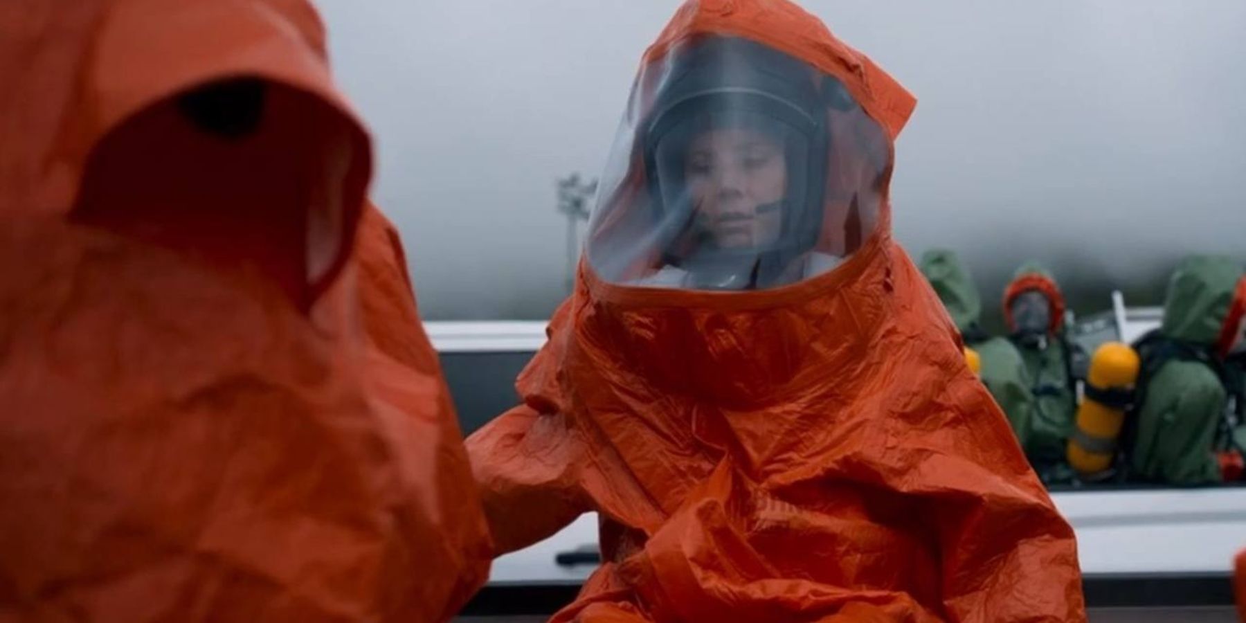 The characters in hazmet suits in Arrival