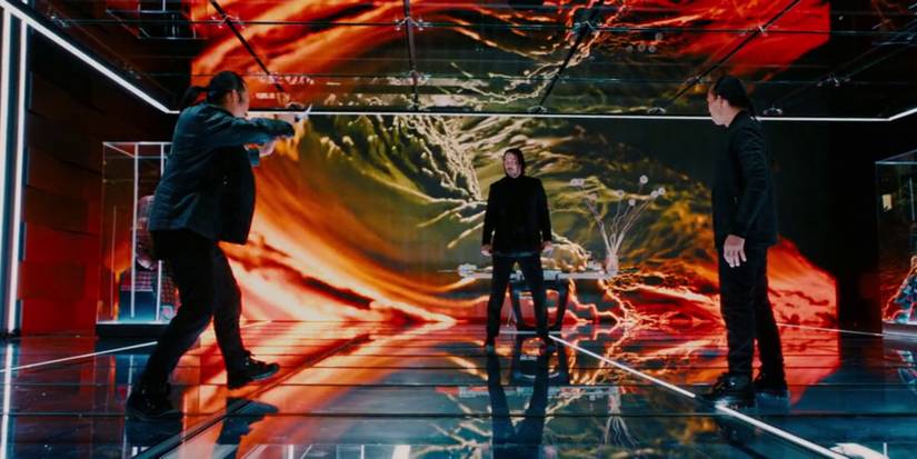 john wick about to fight with a belt