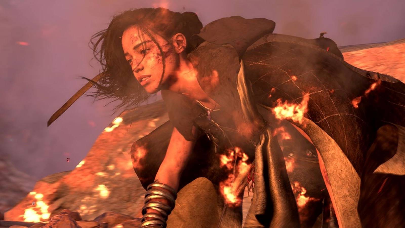 Forspoken protagonist Frey Holland on fire and battle damaged