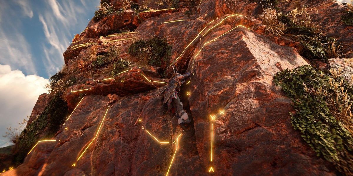 Aloy climbing up the face of a cliff using the Focus to highlight the path she can climb up in Horizon Forbidden West