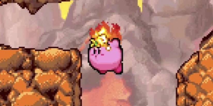 Kirby in the Mustard Mountain Stage with fire on Head surrounded by boulders, using the float ability
