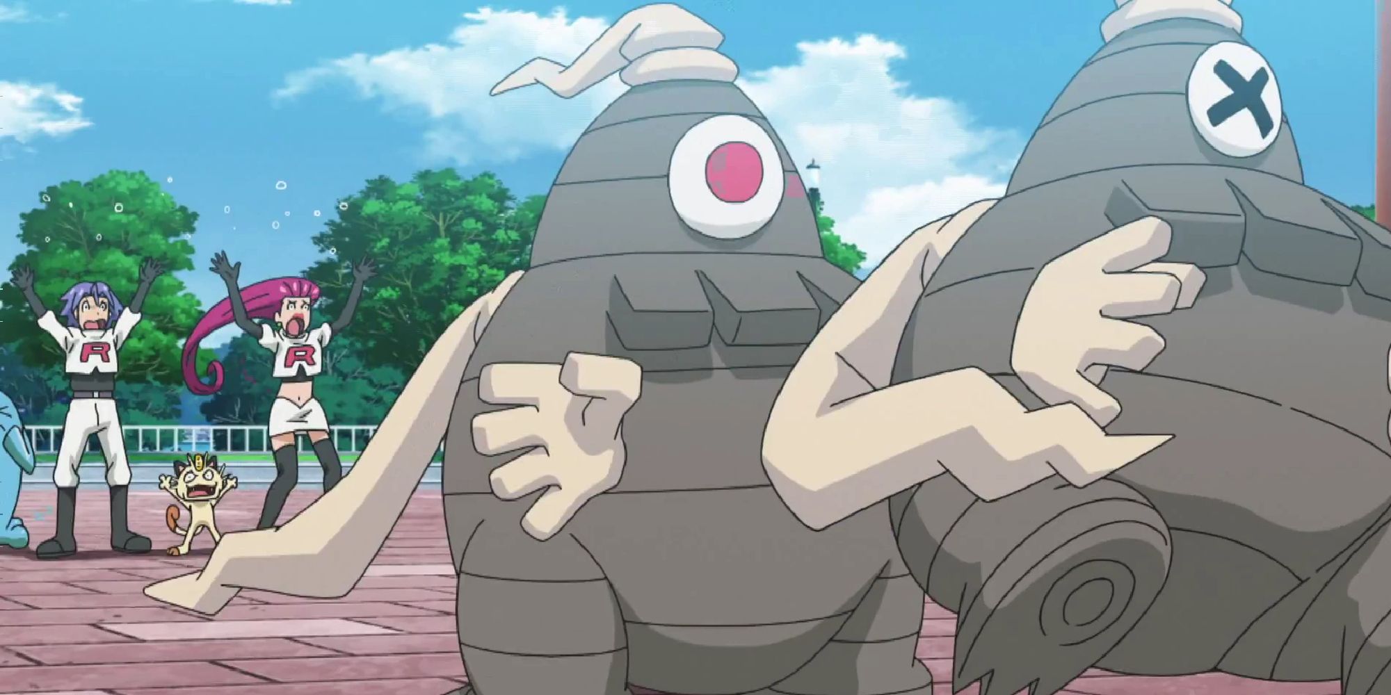 Team Rocket's Dusclops attacking another Dusclops in the Pokemon anime