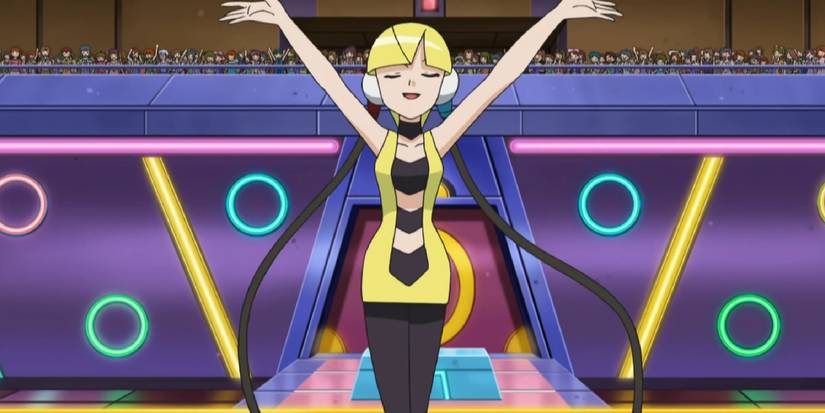 Elesa posing in the Nimbasa Gym in the Pokemon anime