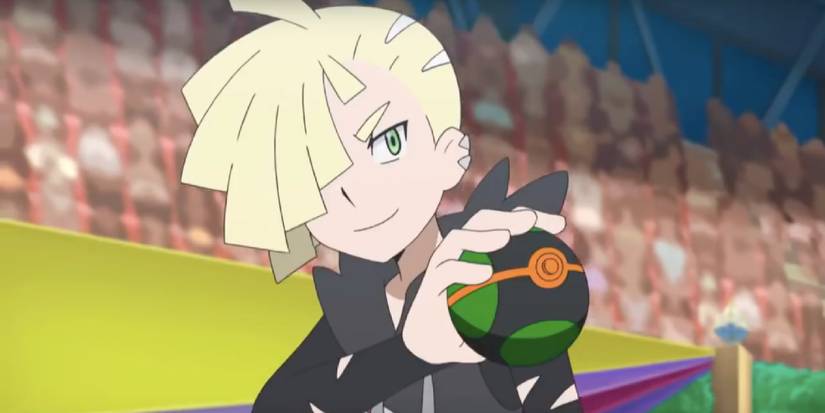 Gladion holding a Dusk Ball in the Pokemon anime