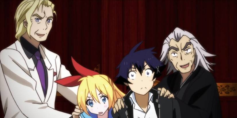 Raku and Chitoge being pushed together by their fathers