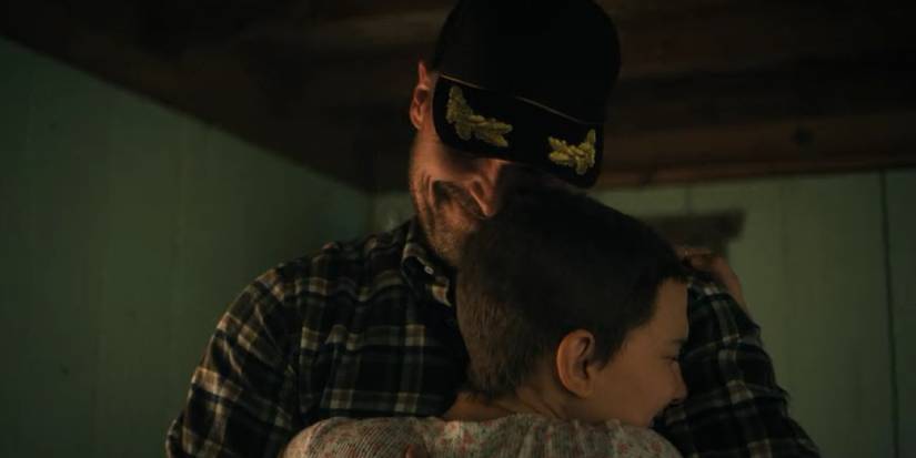 Eleven hugging Hopper in her old bedroom 