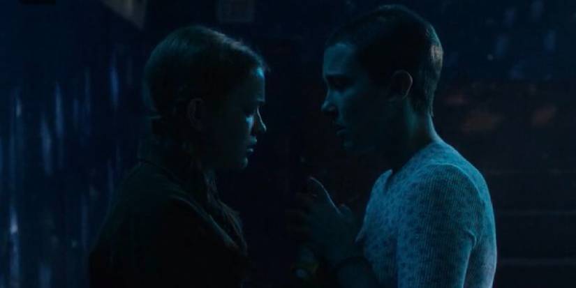 Eleven holding Max's hand in Max's mind