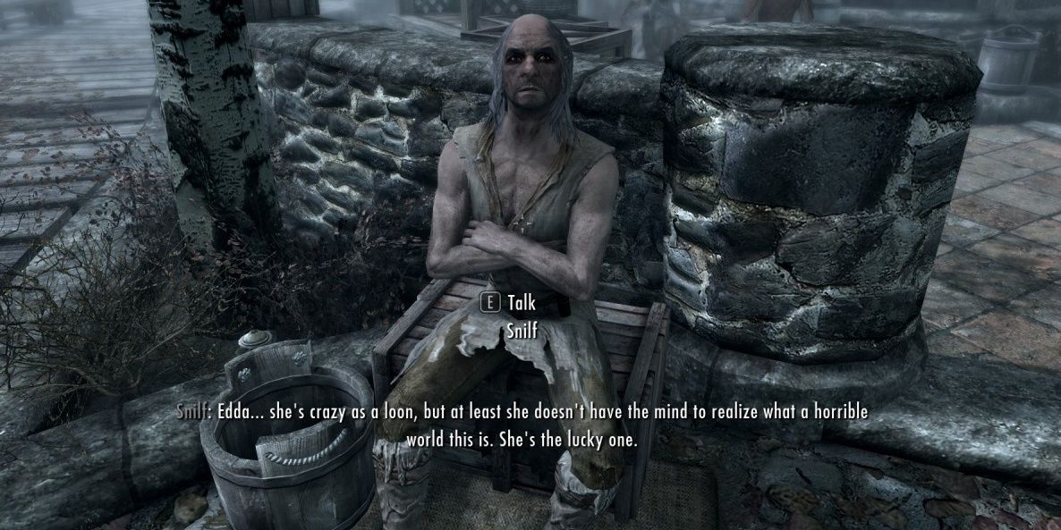 Snilf sitting on a box talking to the player about Edda in Skyrim
