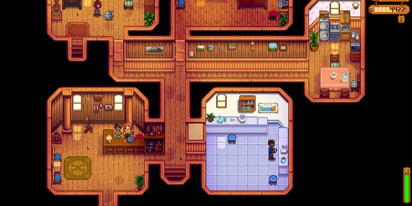 The player standing next to Robin while her husband is in the kitchen and her daughter is in her room in Stardew Valley