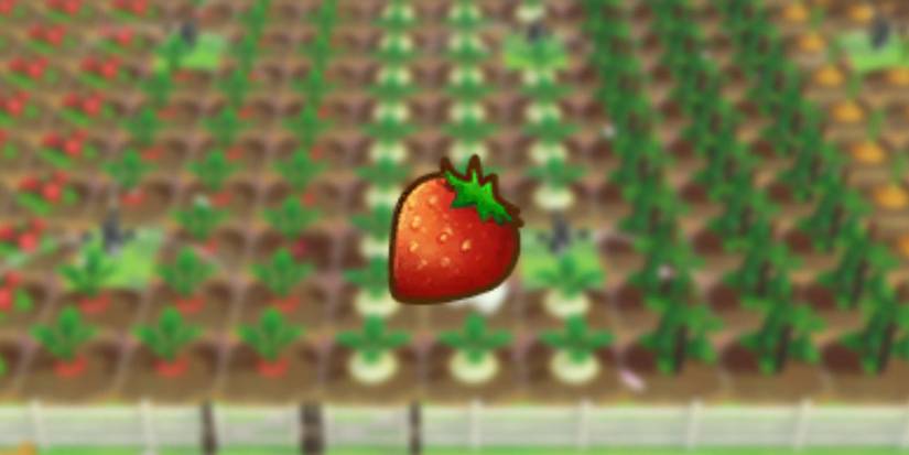 Strawberry icon as it would be seen in players inventory over blurred background of crops in game