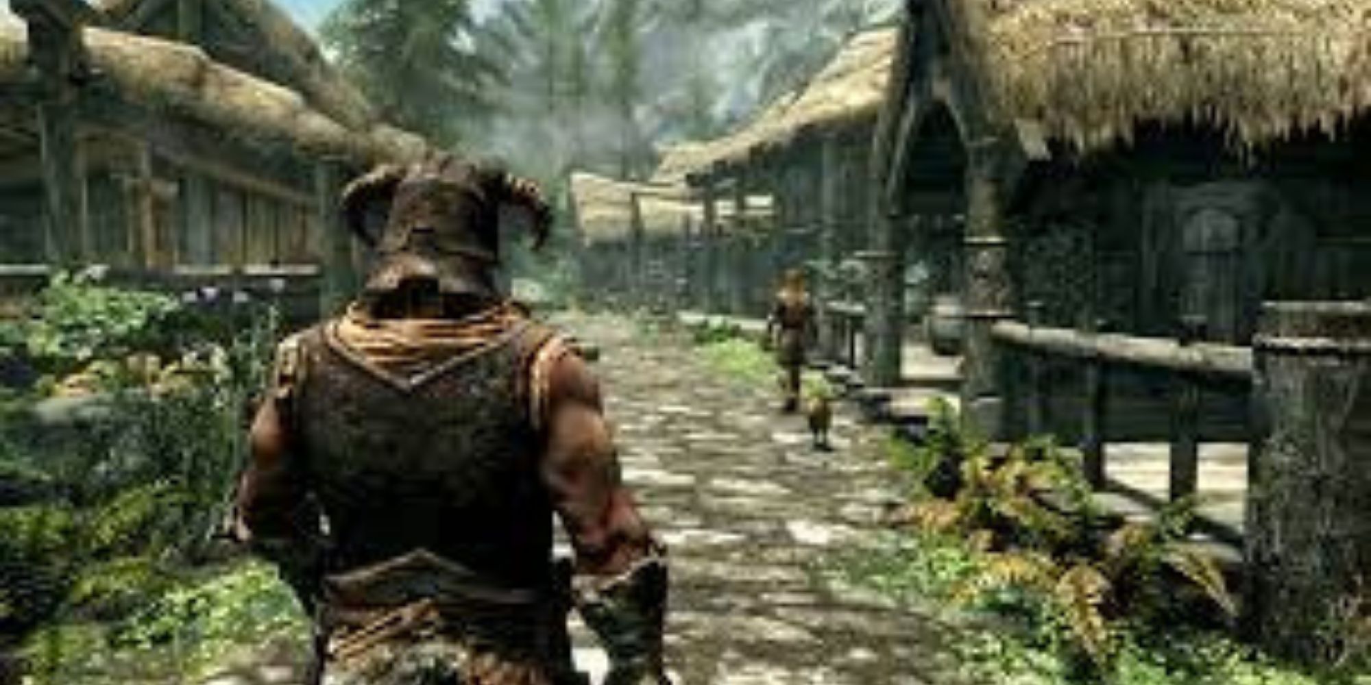 Dovahkiin walkingn in a village in The Elder Scrolls V Skyrim