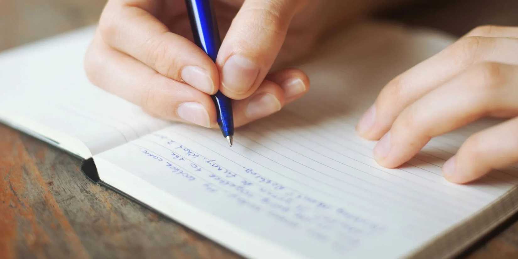 Writing on a Notebook