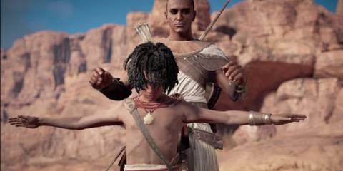 Bayek teaches his son, Khemu, about balance