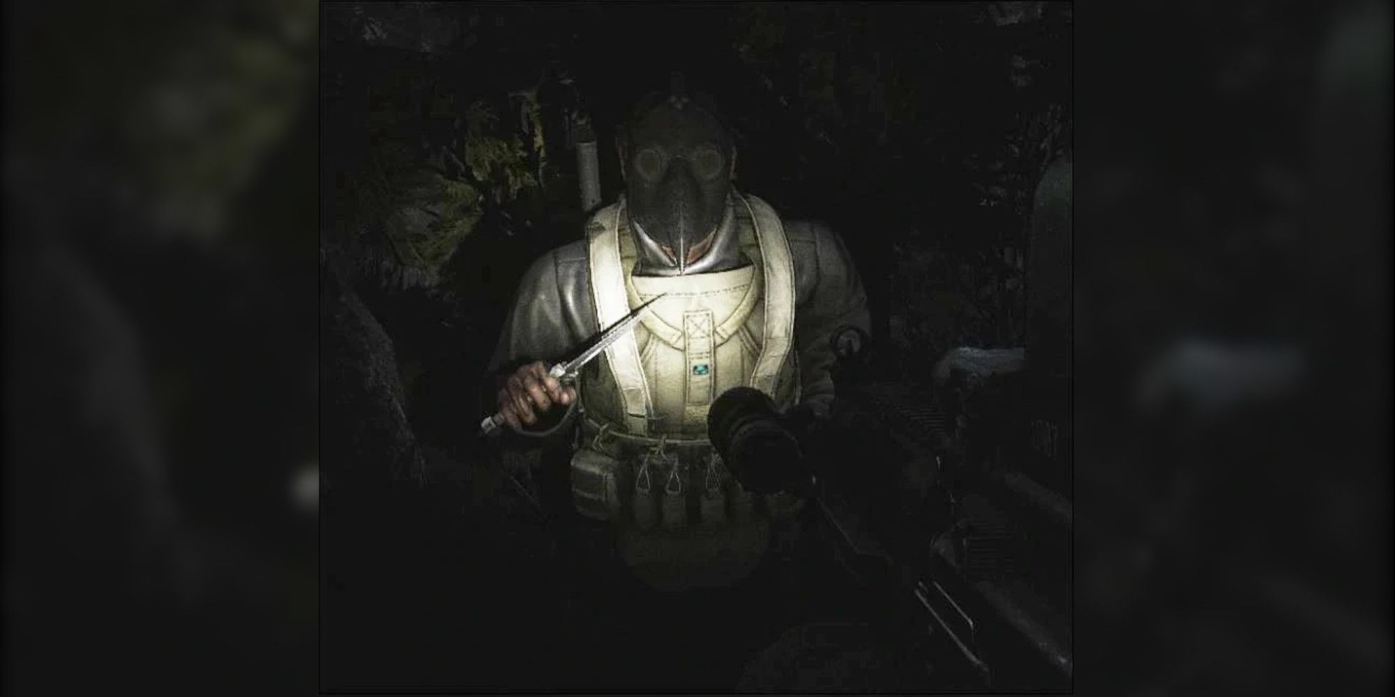 A cultist charges with a knife in the darkness