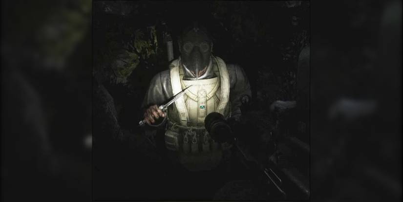 A cultist charges with a knife in the darkness