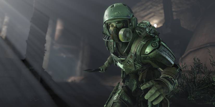 A stealthy, masked character, poised to take down an enemy with a knife