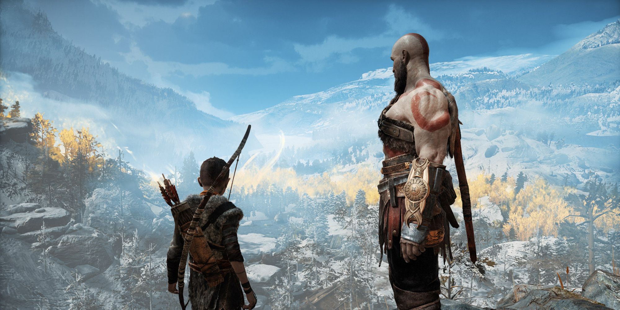 Kratos and Atreus look over a snowy landsacpe