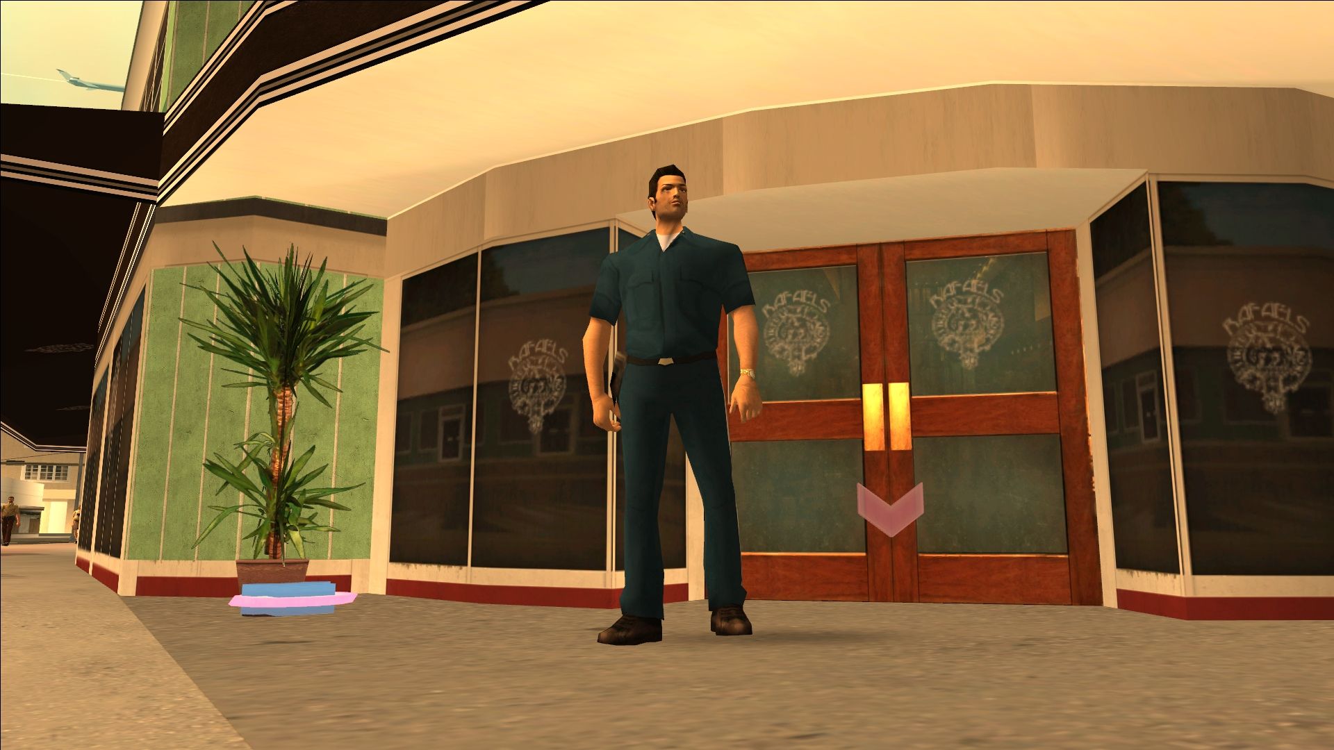 Изображение из Grand Theft Auto: Vice City, показывающее Томми Версетти возле магазина одежды.