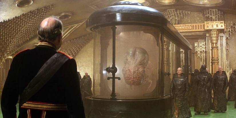 Emperor Shaddam Corrino faces a Guild navigator and its entourage 