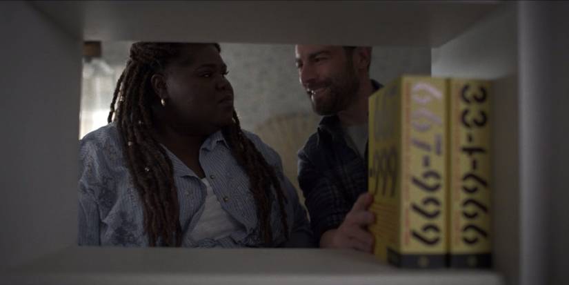Jaslyn (Gabourey Sidibe) and Bryce (Max Greenfield) in American Horror Stories "Aura"