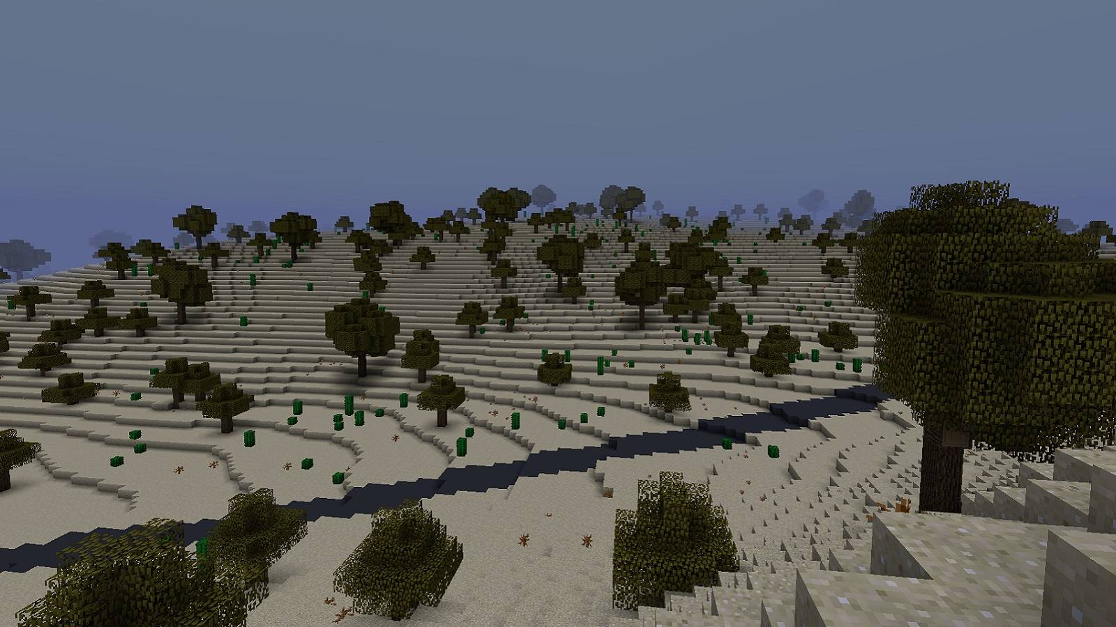 Image from Minecraft showing a savannah-style plain.