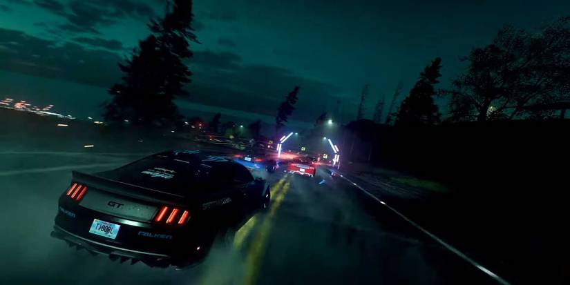 need for speed heat mustang racing at night with other car on the road 