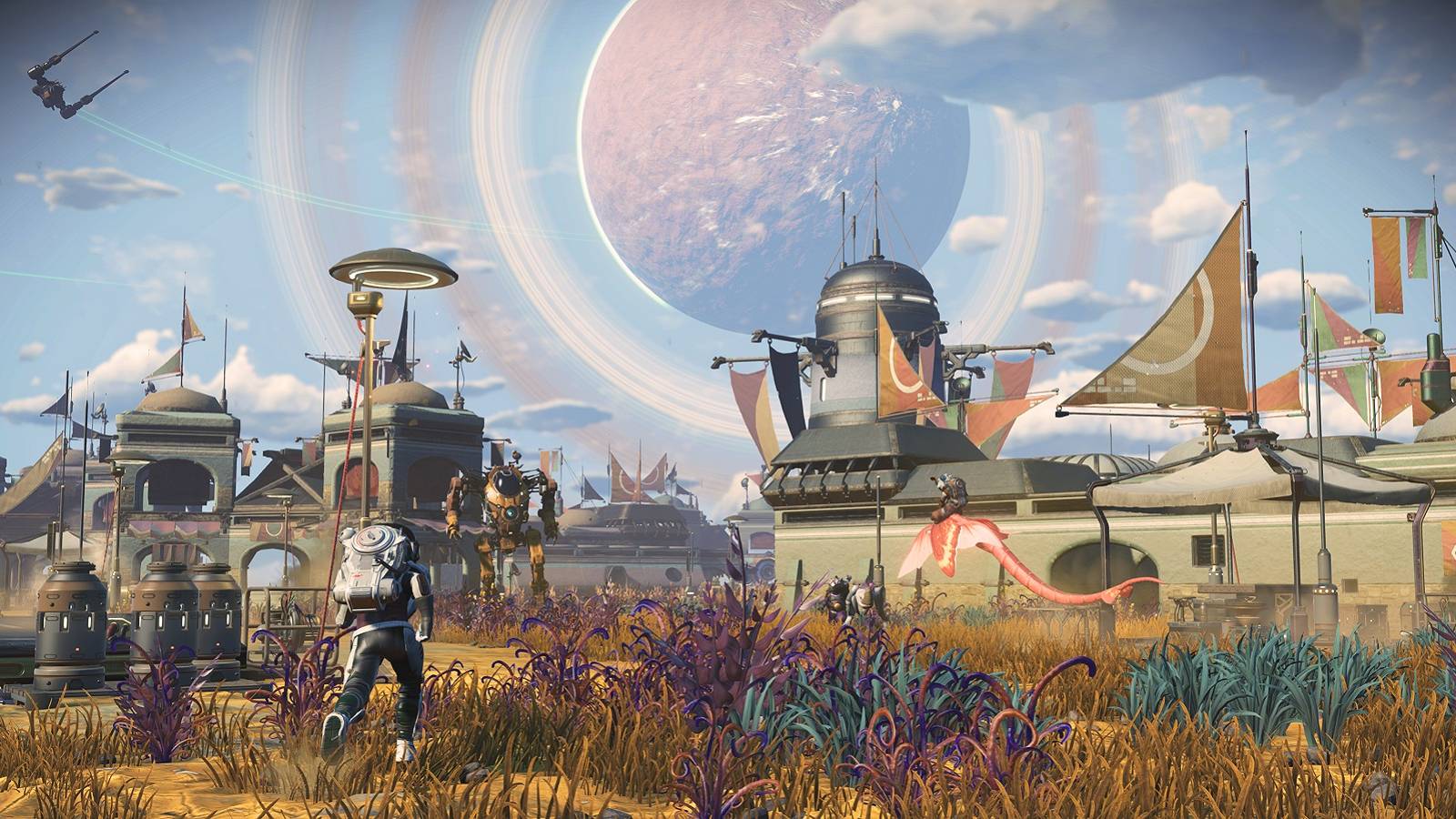 Screenshot from No Man's Sky showing the player approaching a settlment, with another planet hanging in the sky in the distance.