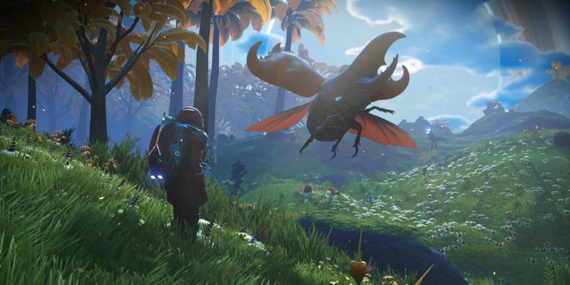 A space explorer looks at a bizarre alien