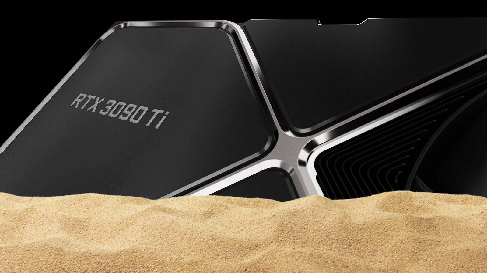 Close-up image of an Nvidia RTX 3090 Ti graphics card with some sand in front of it.