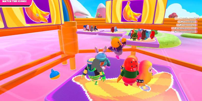 A Group Of Beans Standing On A Matching Tile In The 'Perfect Match' Level In Fall Guys Ultimate Knockout