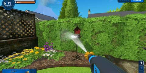 powerwashing a bird house in the yard level in powerwash simulator