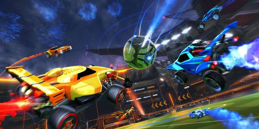 rocket league players boosting towards the ball in the air 