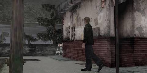 Image from Silent Hill 2 showing James Sunderland leaving the bathroom at the start.