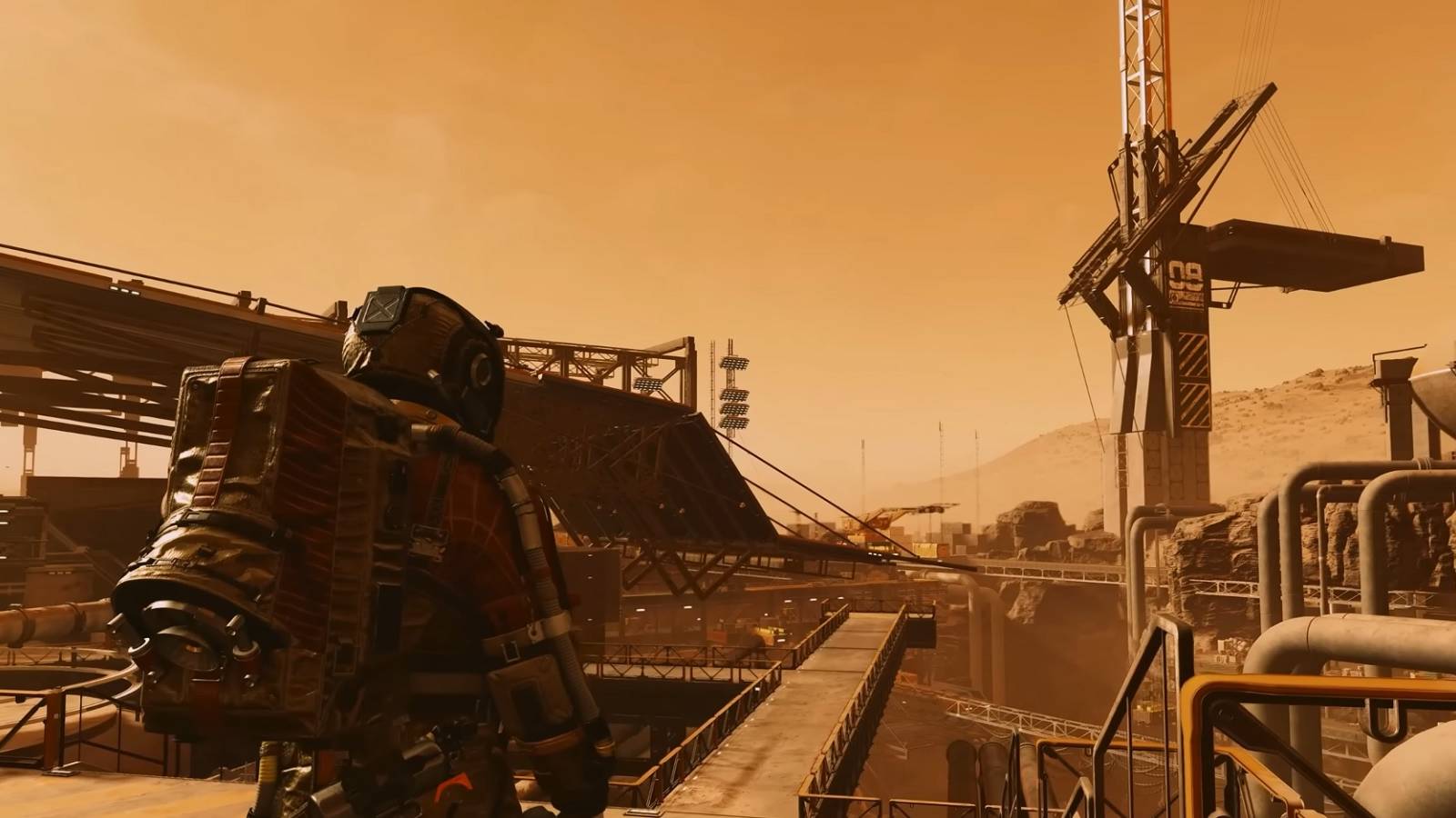 Image from Starfield showing an astronaut and an industrial zone all bathed in orange.