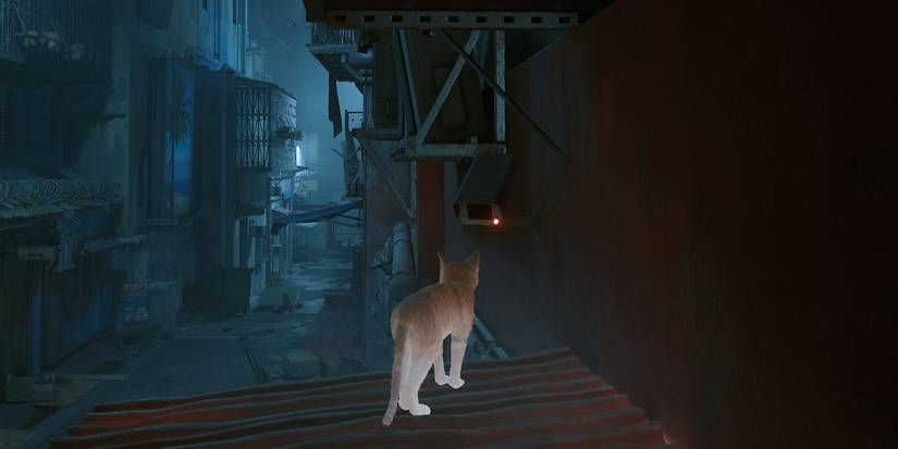 Screenshot from Stray, including cat and CCTV camera