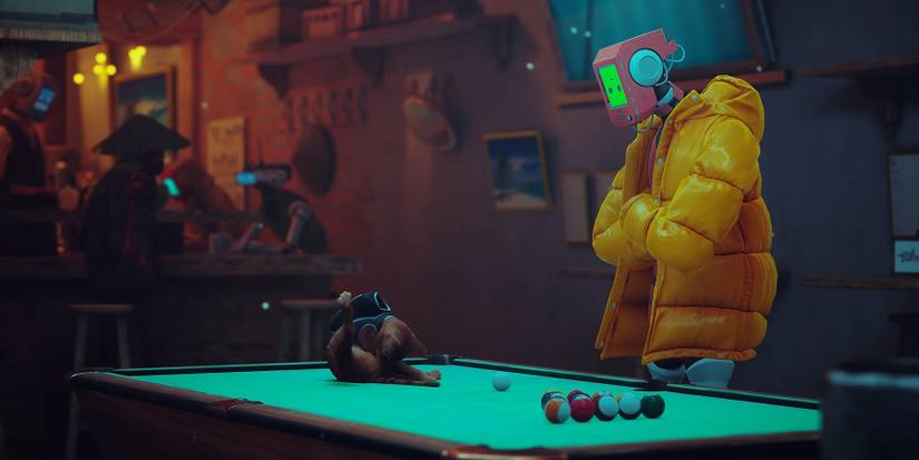 stray protagonist kitty grooming itself while resting on a pool table