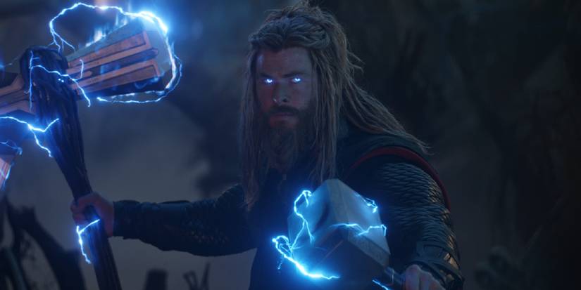 thor holding stormbreaker and mjolnir