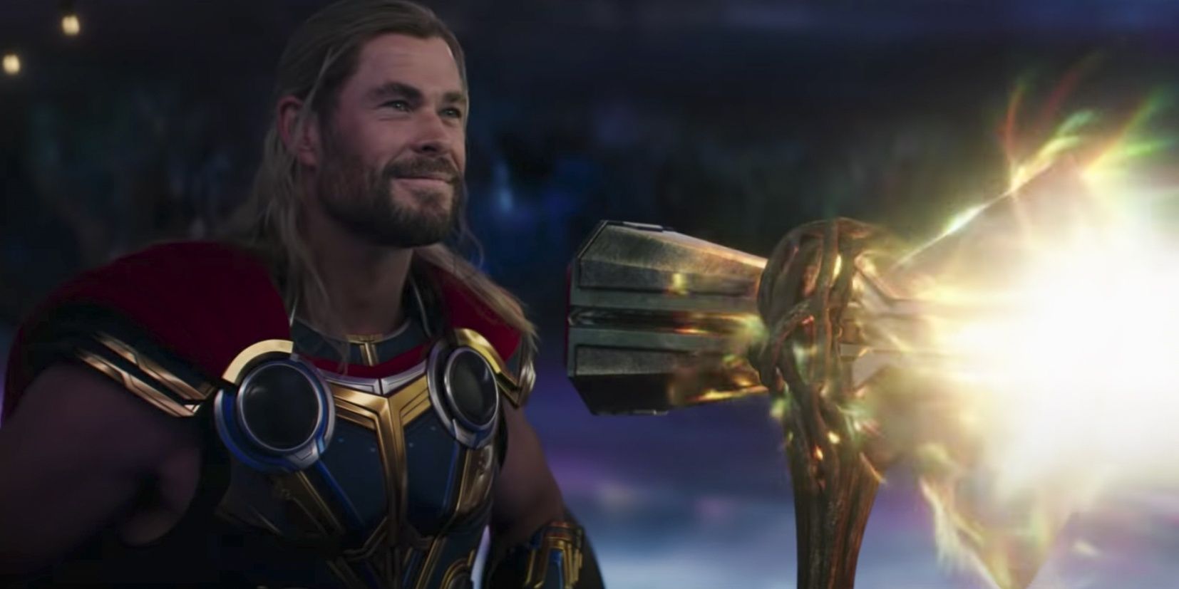 thor smiling with stormbreaker