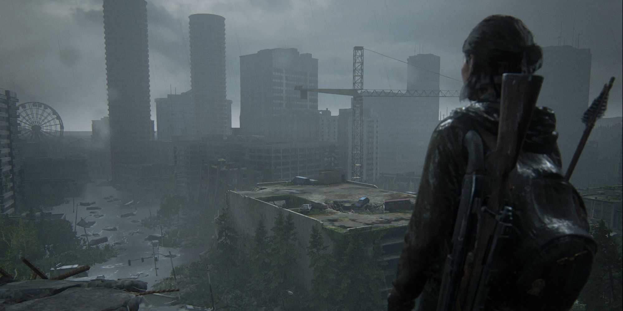 Ellie looks out over a ruined city