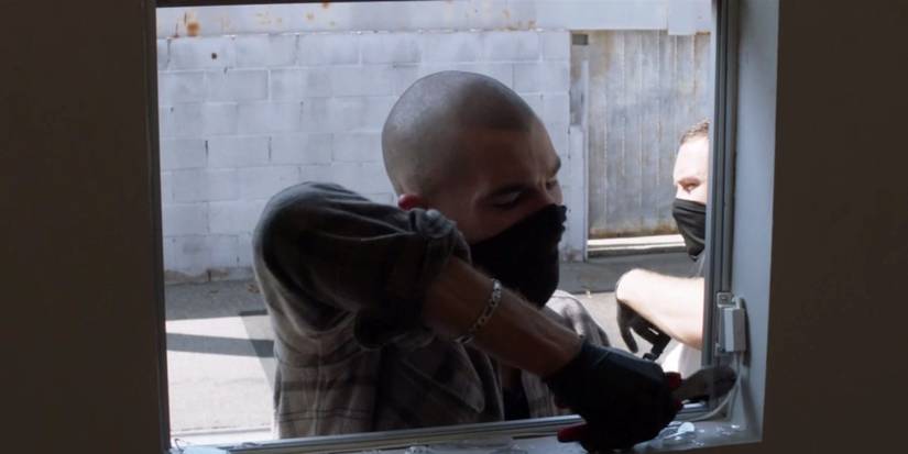 Tommy breaks a window in Animal Kingdom