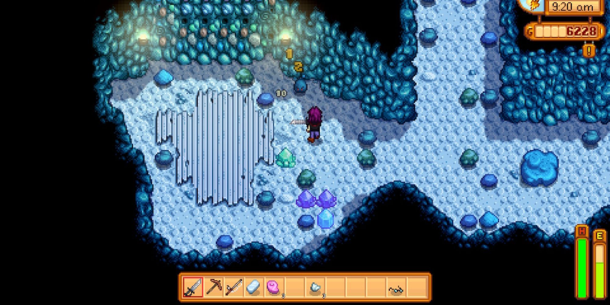 Fighting a slime in The Mine in Stardew Valley